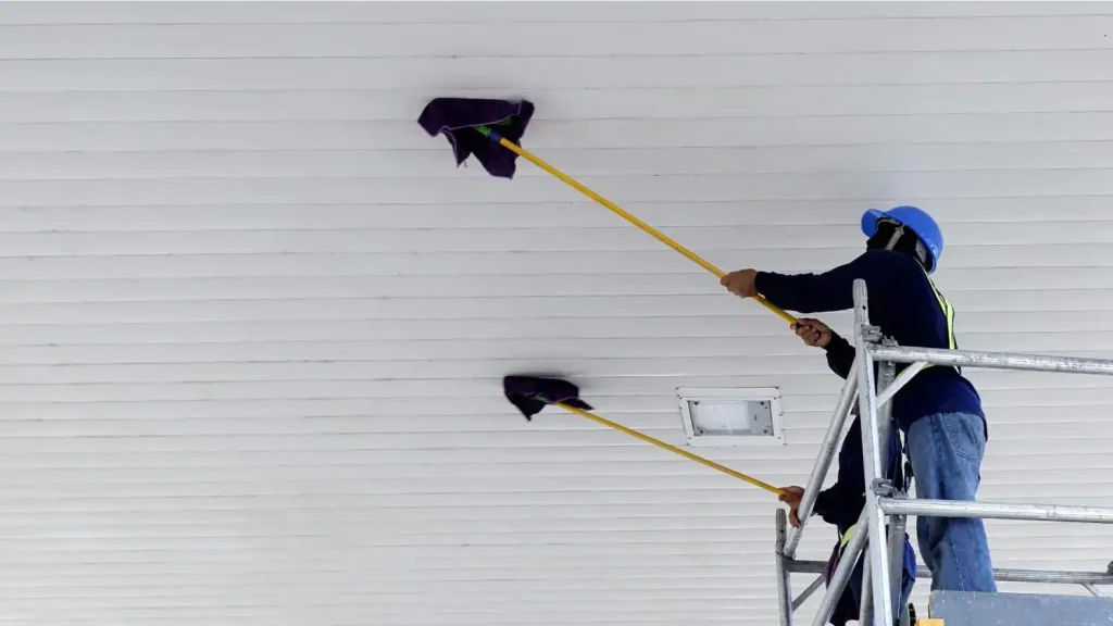 Workers-cleaning-white-ceiling-roof